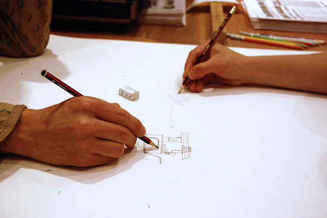 Makeshift (Karl Khoe and Tessa Zettel) working on an audit of their project for In the Balance, 2010.